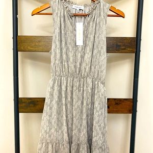 Wonderfully detailed dress with front tie